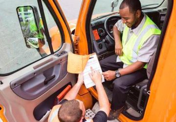 Two guys training with truck